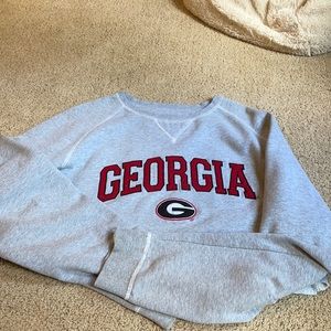 a cropped georgia sweatshirt